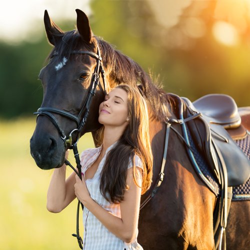 pecan-creek-ranch-woman-horse-field